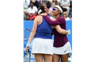 BIRMINGHAM, ENGLAND - JUNE 15:  Raquel Kops-Jones and Abigail Spears (L) of the United States celebrate victory in the Doubles Final during Day Seven of the Aegon Classic at Edgbaston Priory Club on June 15, 2014 in Birmingham, England.  (Photo by Tom Dulat/Getty Images)